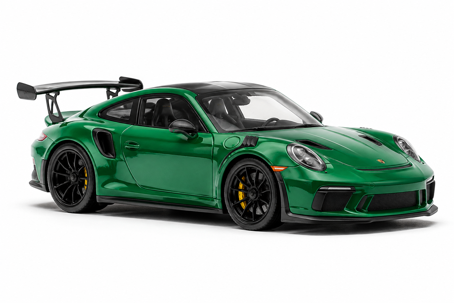 Green GT diecast car on white
