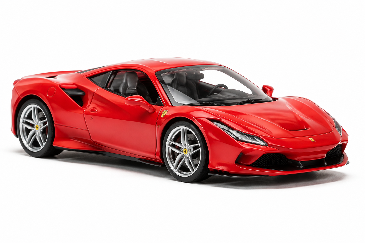 Red supercar diecast car on white